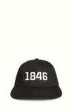 (5–18 Years) Classic 1846 Kids’ Cap – Bold Black & White Statement
